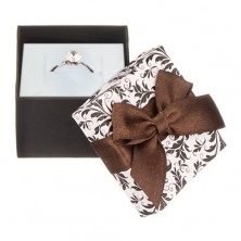 Black and white jewellery gift box with ornaments and brown ribbon