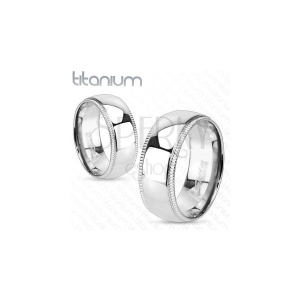 Titanium ring with decorative knurled border
