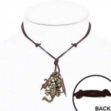 String necklace made of leather, metal pendants, scorpion, knife