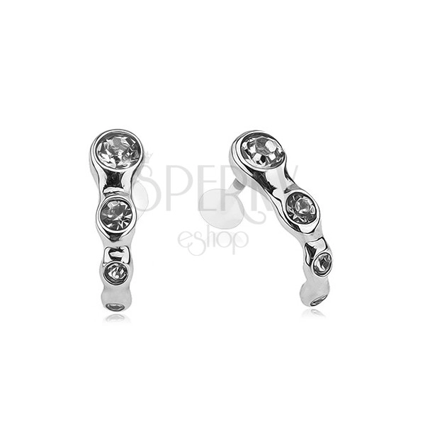 Curved steel piercing with clear zircons