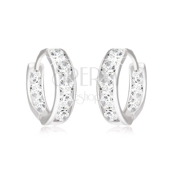Earrings made of white 14K gold - round, embedded clear zircons