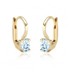 Earrings made of yellow 14K gold - oval blue topaz gripped with four pins