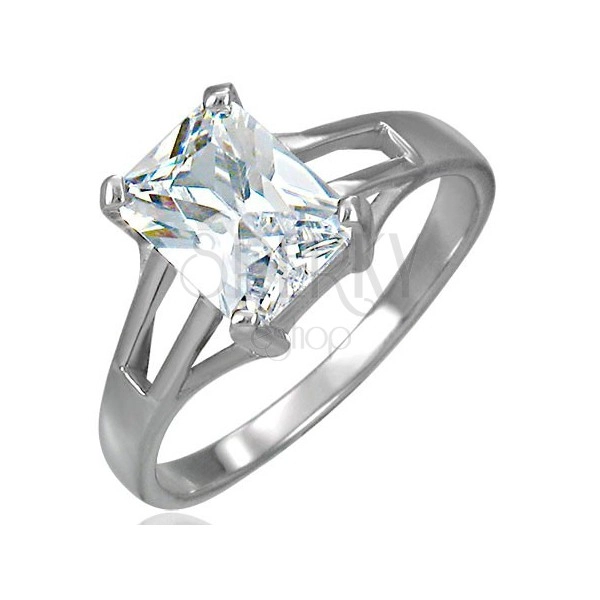 Engagement ring with big rectangular zircon and cut-out parts