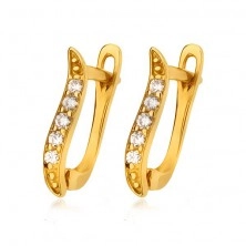 Earrings made of yellow 14K gold - delicate vertical wave, round clear stones