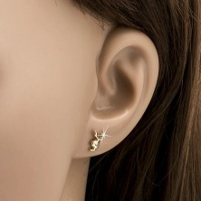 Earrings made of yellow 14K gold - shiny head of a bunny