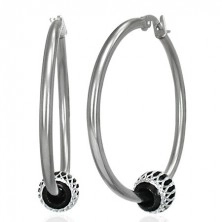 Steel earrings, circles with black ball with cutouts