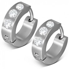 Shiny hoop earrings made of steel, three clear zircons