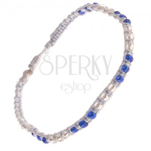 Pale blue string bracelet, clear and dark blue glass beads