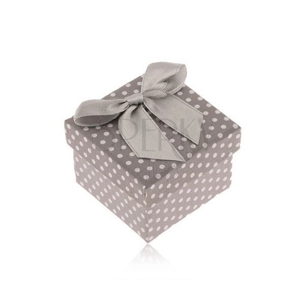 White and grey dotted box for a ring, shiny bowknot