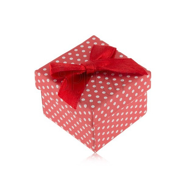 Red and white dotted box for a ring, shiny bowknot
