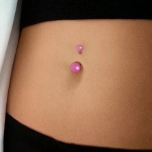 Belly button piercing with semi-transparent balls