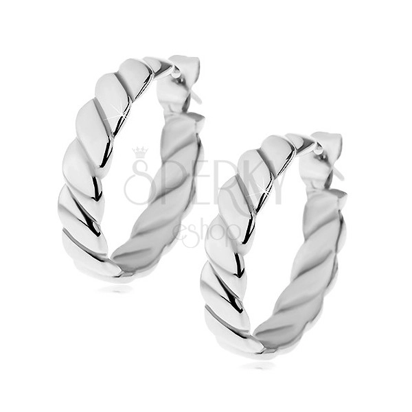 Round earrings made of surgical steel in silver hue, twisted strips