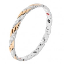 Bracelet made of steel in golden and silver colour, slanted strips, snake pattern