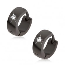 Earrings made of steel of black colour, shiny and smooth surface, clear stone