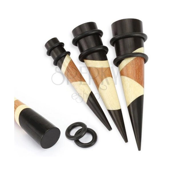 Wooden ear taper in black and brown colour, organic material, rubber bands