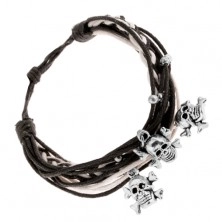 Black and white braided bracelet, steel balls and pendants - skulls with bones