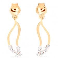 Earrings made of yellow 9K gold - outline of wider wave, clear zircons
