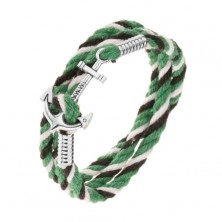 Bracelet made of strings in black, white and green colour, shiny anchor in silver colour