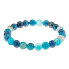 Flexible bracelet, beads in blue colour made of agate stone on a strong band