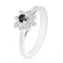 Shiny ring in silver hue, narrowed shoulders, zircon flower