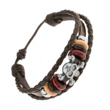 Multibracelet made of leather and strings, beads made of steel and wood, skull with bones
