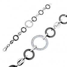 Bracelet made of black ceramic circles and steel links, clear zircons