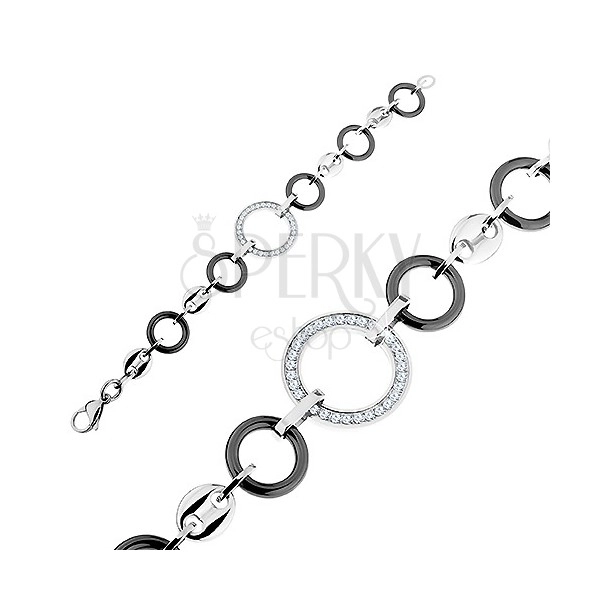 Bracelet made of black ceramic circles and steel links, clear zircons