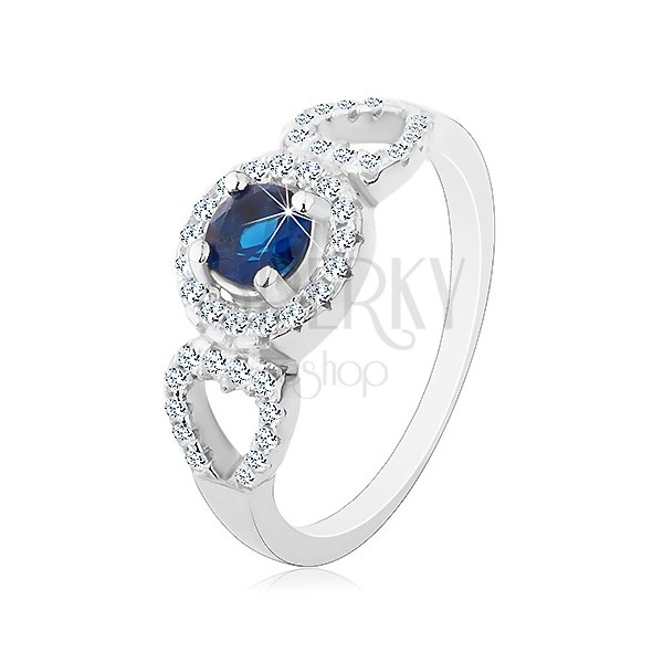 Ring made of 925 silver, round blue zircon, glossy heart contour on the sides