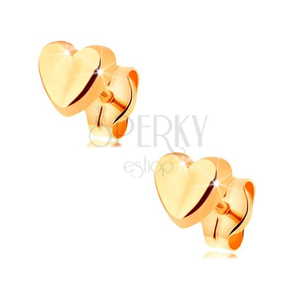 Earrings made of yellow 14K gold - tiny heart with slightly protruding surface