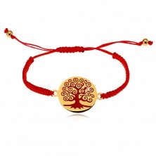 Bracelet made of red strings, round pendant with red tree