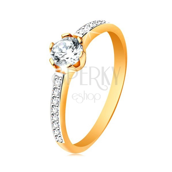Ring made of 14K gold - glistening round zircon in clear colour, zircon shoulders
