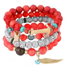 Multibracelet made of beads in red, white and coral colours, pendants