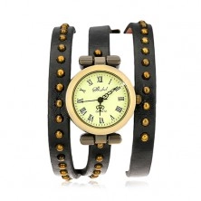Wrist watch, narrow studded strap in black colour with triple wrap around