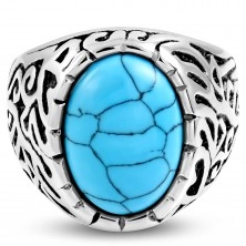 Steel ring, turquoise oval, shoulders decorated with cutouts and black patina