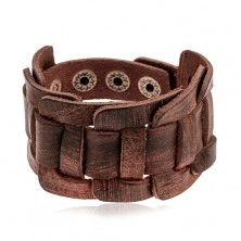 Wide bracelet made of synthetic dark brown leather, braided pattern, cut surface