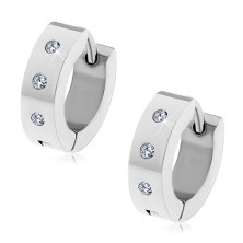 Steel hinged snap earrings in silver colour, three clear round zircons