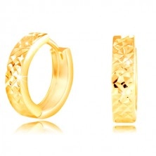 Round 14K gold earrings with cut shimmering surface, high gloss
