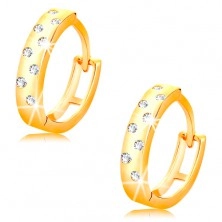 Earrings made of yellow 14K gold - shiny circles with clear zircons