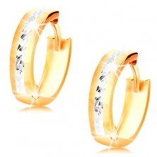 Earrings made of 14K gold - glistening circles decorated with notches and white gold
