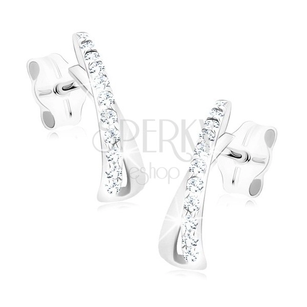 Earrings made of white 14K gold - loop curved into arch, clear zircons