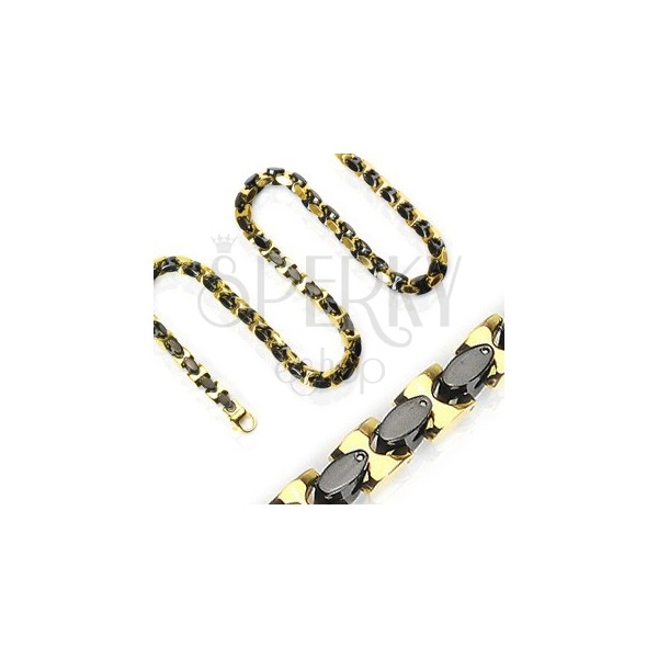Steel chain, shiny oval links in gold and black colour