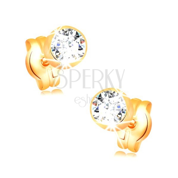 Earrings made of yellow 14K gold - round clear zircon in mount, 4 mm