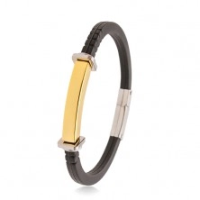 Black bracelet made of rubber, steel tag in gold colour, squares and circles on the sides