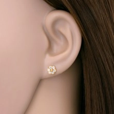 Earrings made of yellow 14K gold - flower with smooth contours and clear zircons