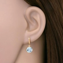 Earrings made of yellow 585 gold - thin arc and cut topaz in blue colour