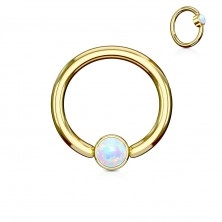 Piercing made of 316L steel, shiny circle in gold colour with synthetic opal