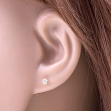 14K yellow gold stud earrings - clear circular zircon in a mount, 2,5 mm