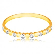 Ring in yellow and white 585 gold - two-coloured circles and clear zircons