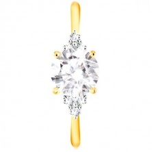 Ring of 14K gold - big clear zircon in the middle, three zircons on the sides