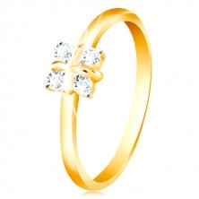 14K gold ring - shiny rounded shoulders, four clear zircons, cross in the middle